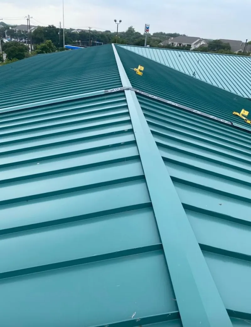 Green commercial metal roof ridge and valley for Metal Roof Repair in Eaton Rapids