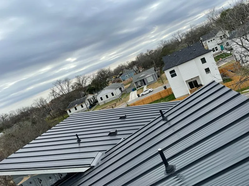 Standing seam metal roof panels with vents for Skylight Repair in Eaton Rapids